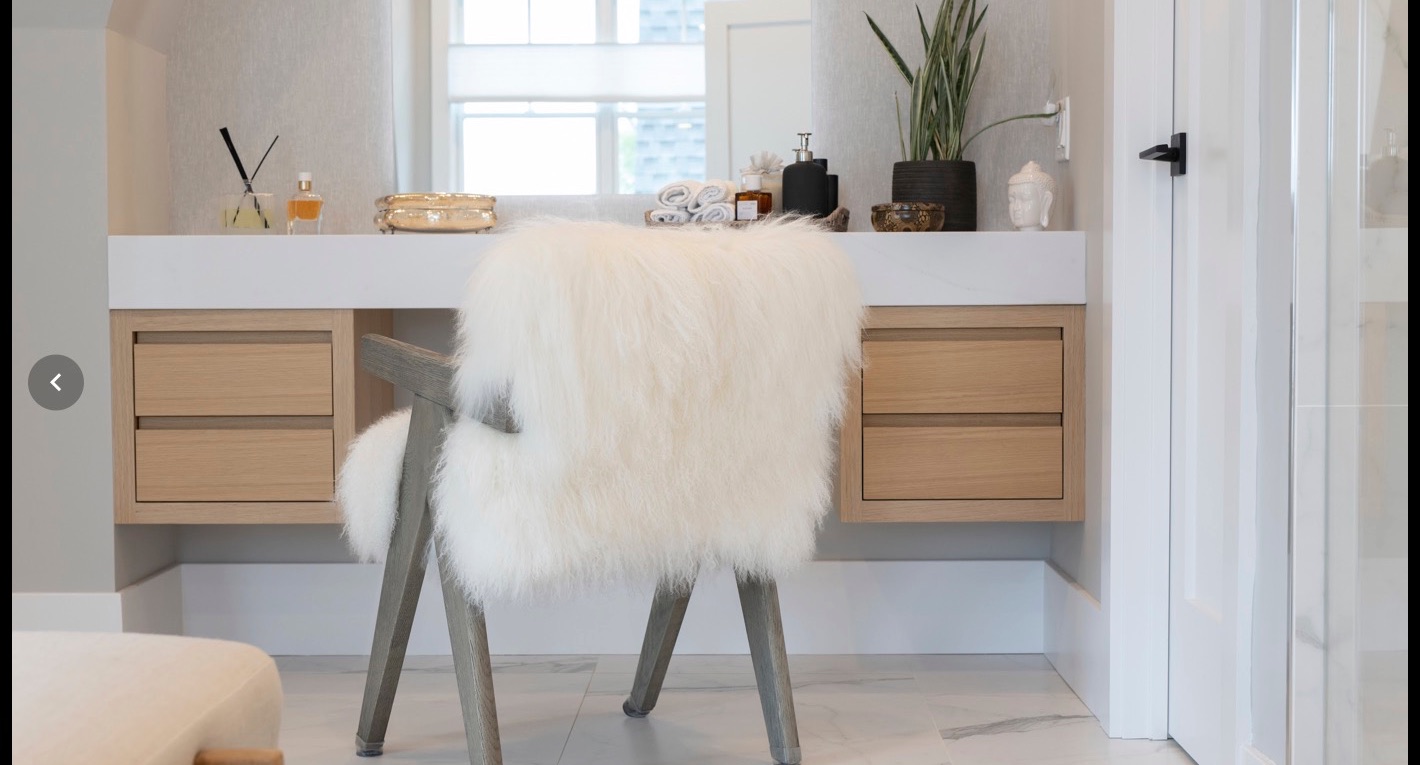 Vanity nook with a sheepskin stool