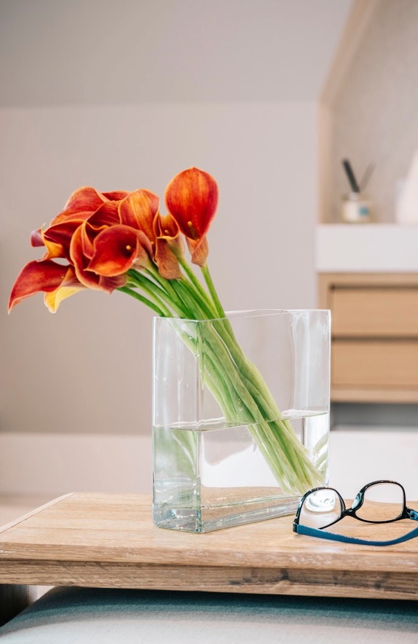 Red tulips on a vanity