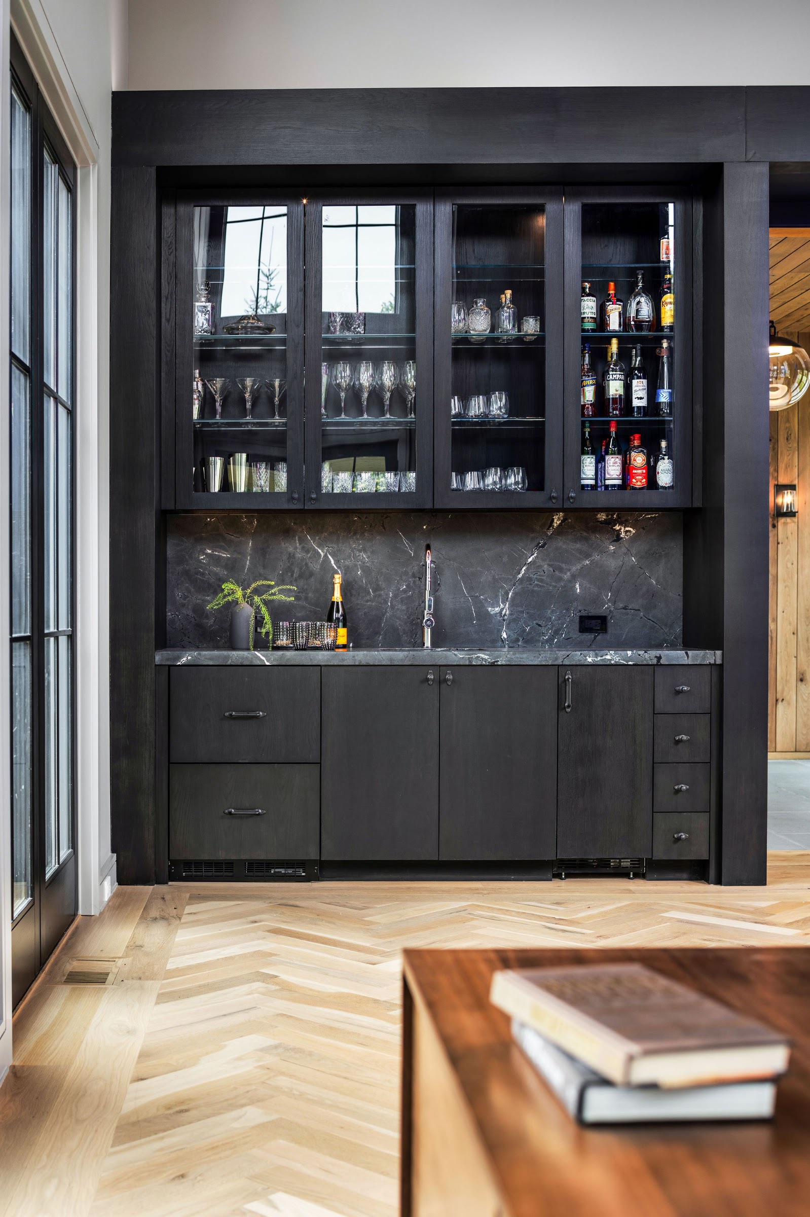Butler's pantry with glass-front cabinets