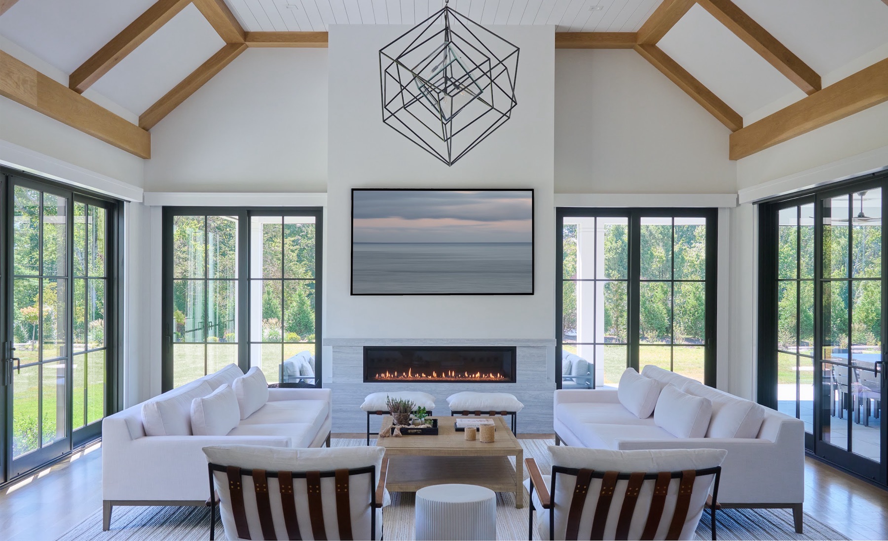 Living room with vaulted ceiling and fireplace